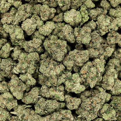 Close-up of green cannabis buds, THCa Flower - Indica - 3.5g - Revelry branded packaging with owl totem design on a white background, as seen on StewartHemp.com